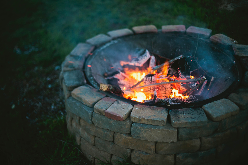 A firepit burning in the evening