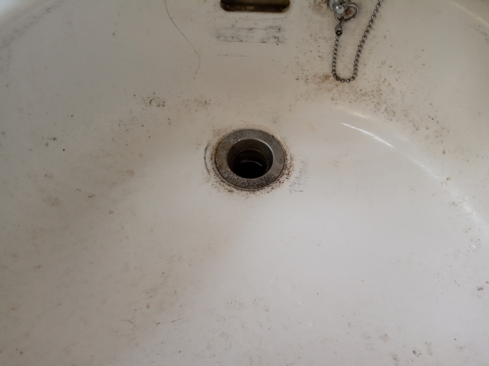 Moderately scuffed porcelain sink