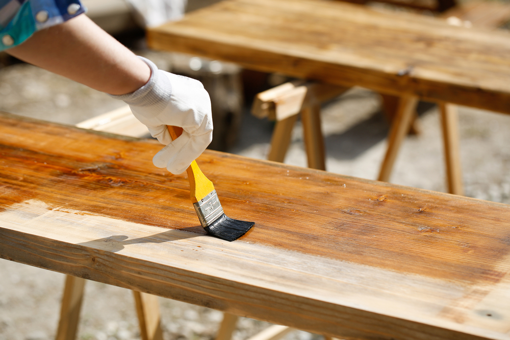 Person applying wood finish