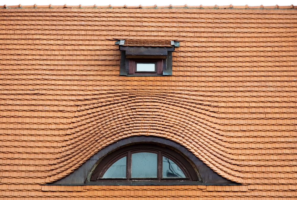 Eyebrow dormer window