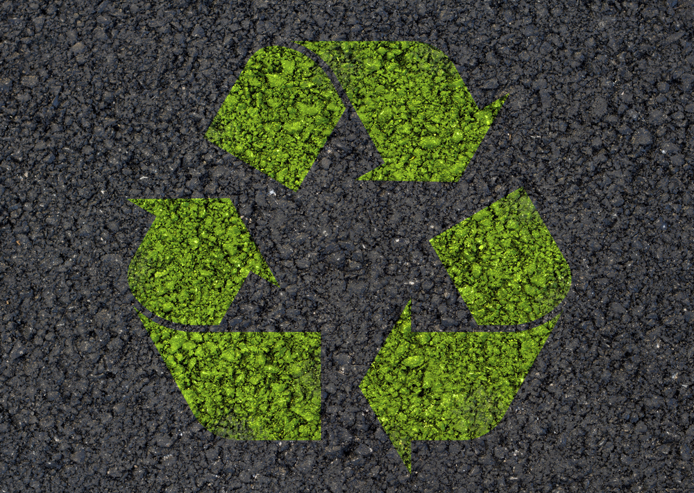 asphalt with recycling symbol