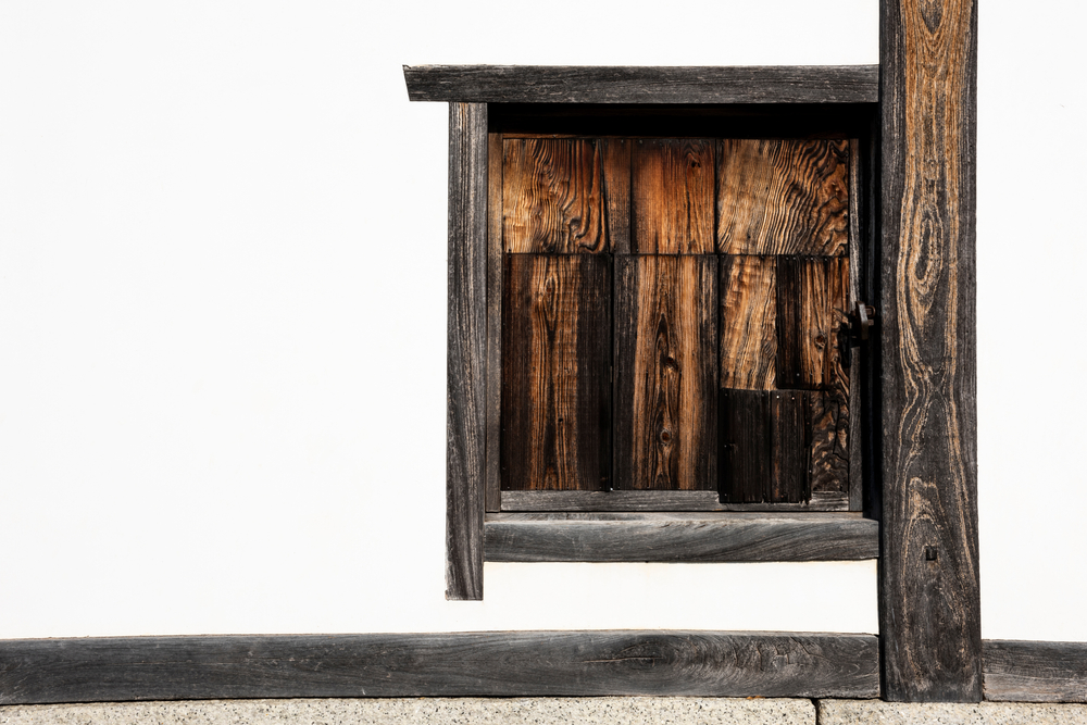 wooden window with burnt wood finish