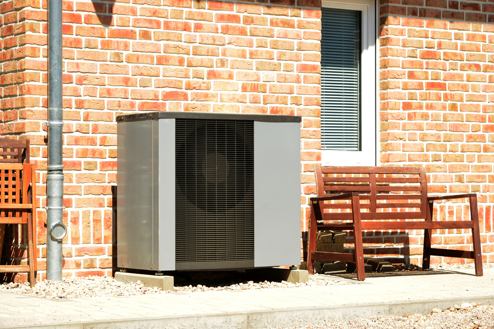 A heat pump is installed outside the home