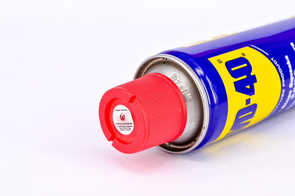 can of WD-40 with white background