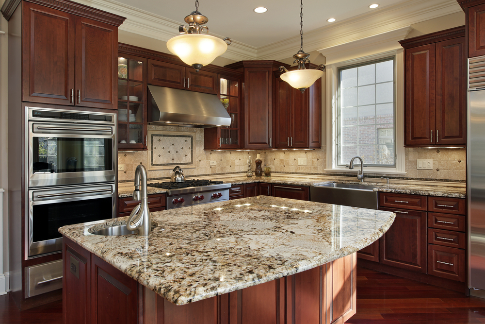 nice kitchen with cherry cabinets and granite countertops