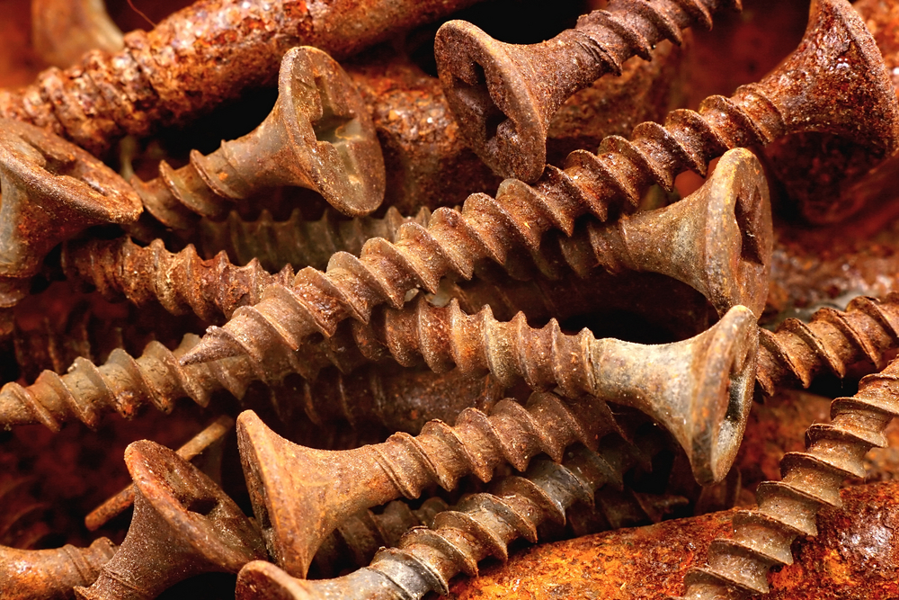 pile of rusty screws