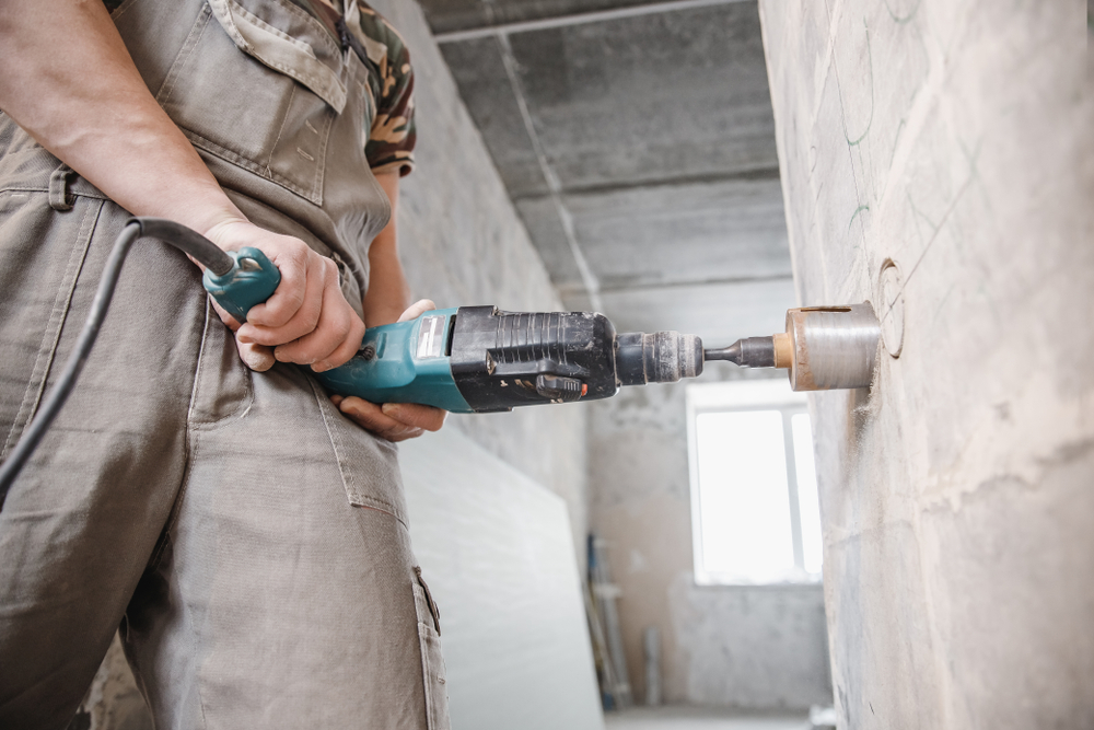 rotary hammer used with a hole saw