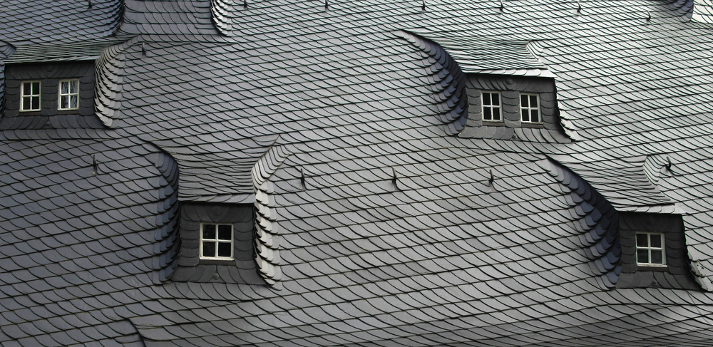 slate shingle roof with dormers