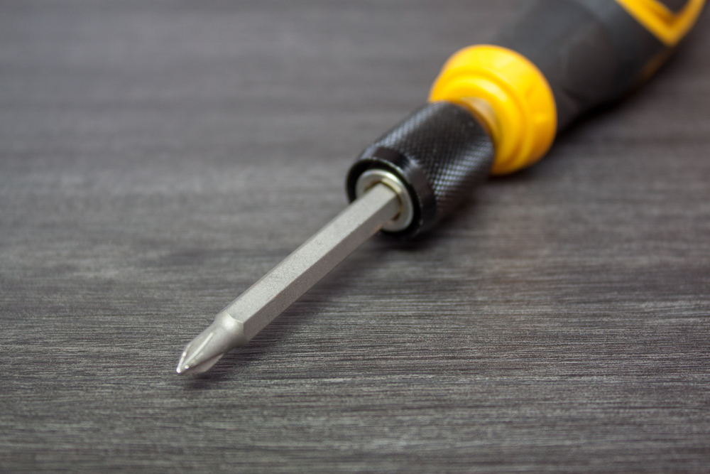 Phillips screwdriver with yellow and black handle
