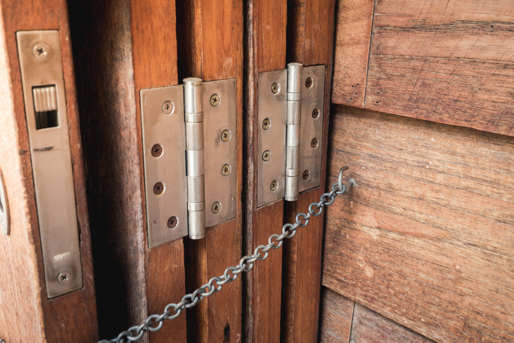 bi-fold hinge on vintage wooden door