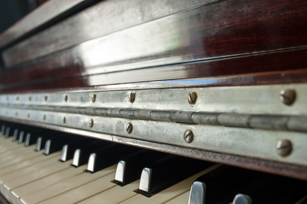 metal hinge on piano