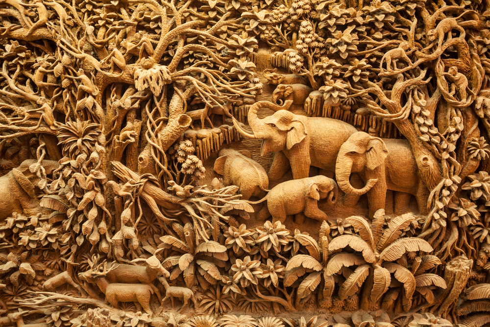 relief carving of elephants in a jungle