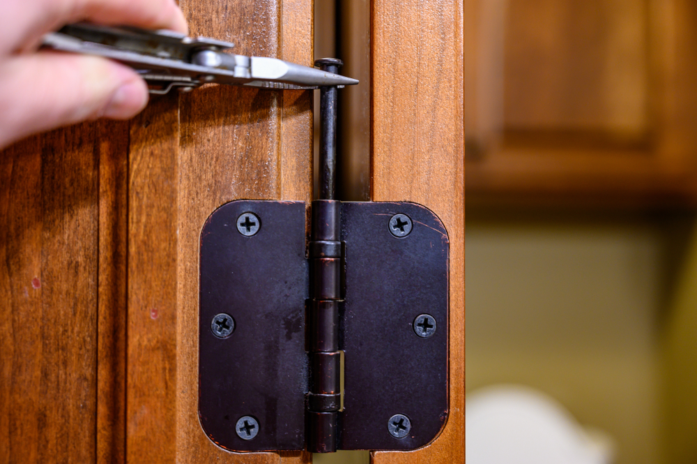 take-apart hinge on old bronze door